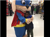 Mascot and little boy