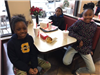 Three young children at ChickfilA