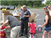 Officer Gives Out Helmets