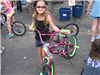 Girl With New Bike Smiles