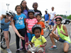 Group of Children Smile With Helmets