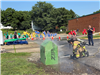 Copley Fireman Demonstrates to Safety Town Students How Firefighters Extinguish and Suppress Fires with Water on Day 5 of Safety Town 2025