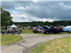 A landscape picture of the Food Trucks and Motorcycles at Copley Car Show 2025