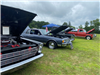 Rows of Vintage Cars With Their Hood On Display at Car Show 2025