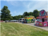Food Truck Vendors Lined Up in the Parking Lot at Copley Community Park