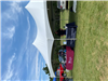 Vendors Set Up Under a White Tent At Copley Community Park on Saturday For Heritage Days 2025