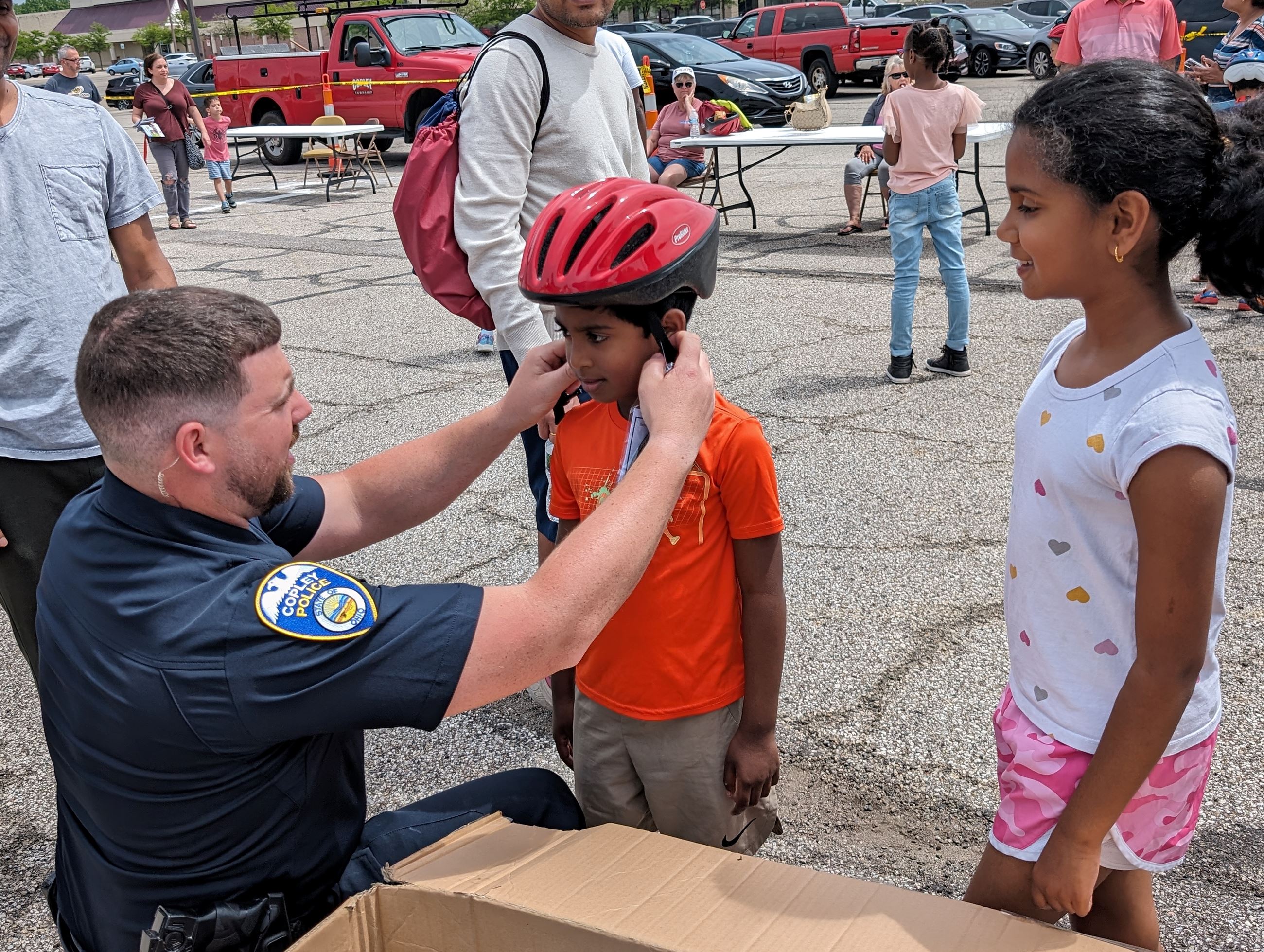 Fitting helmet 1; Bike Rodeo; Copley PD; 2024
