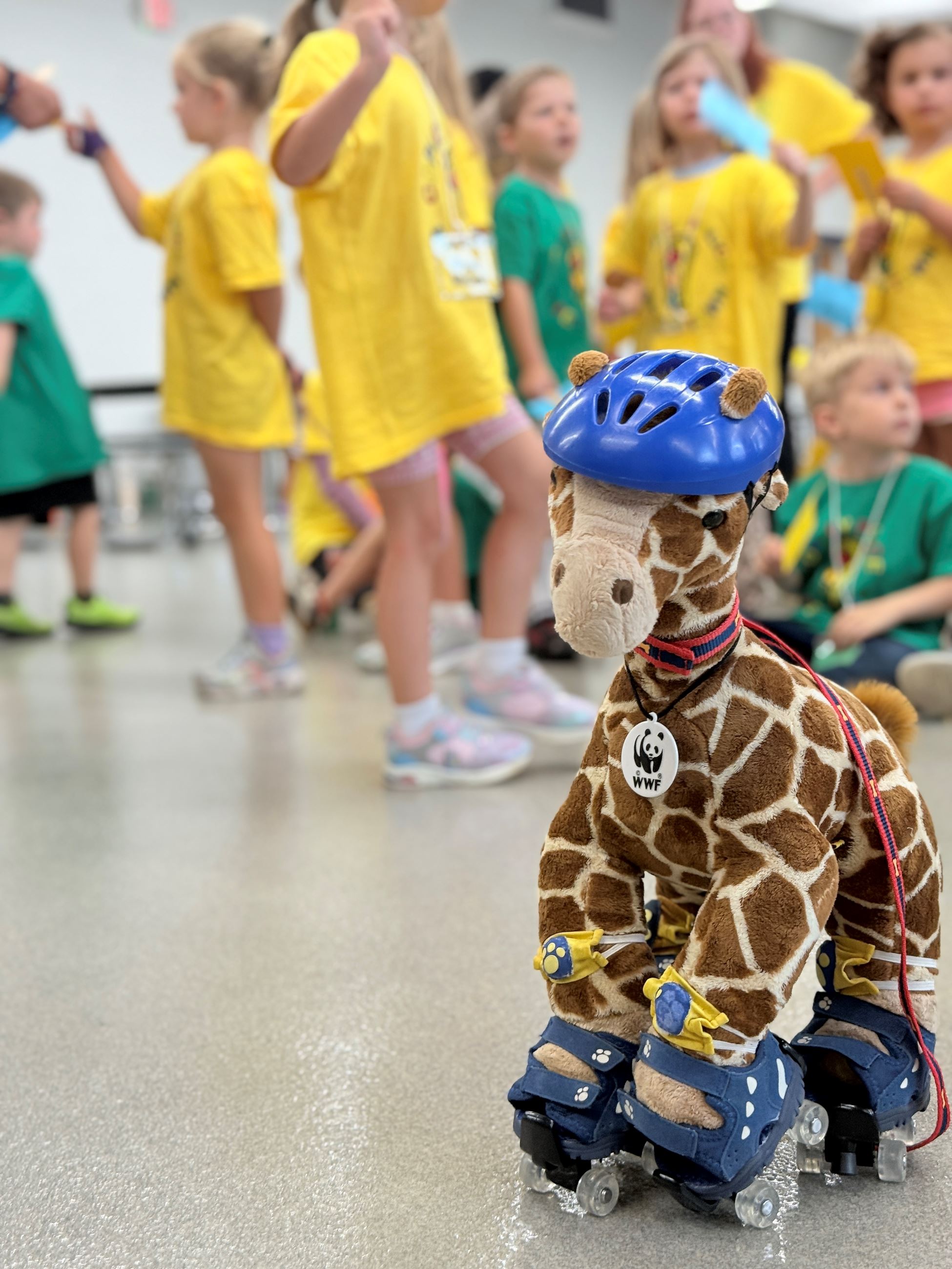 Roller Skating Giraffe Teaches Importance of Wearing Helmets to Safety Town Students on Day 2 of Safety Town 2025