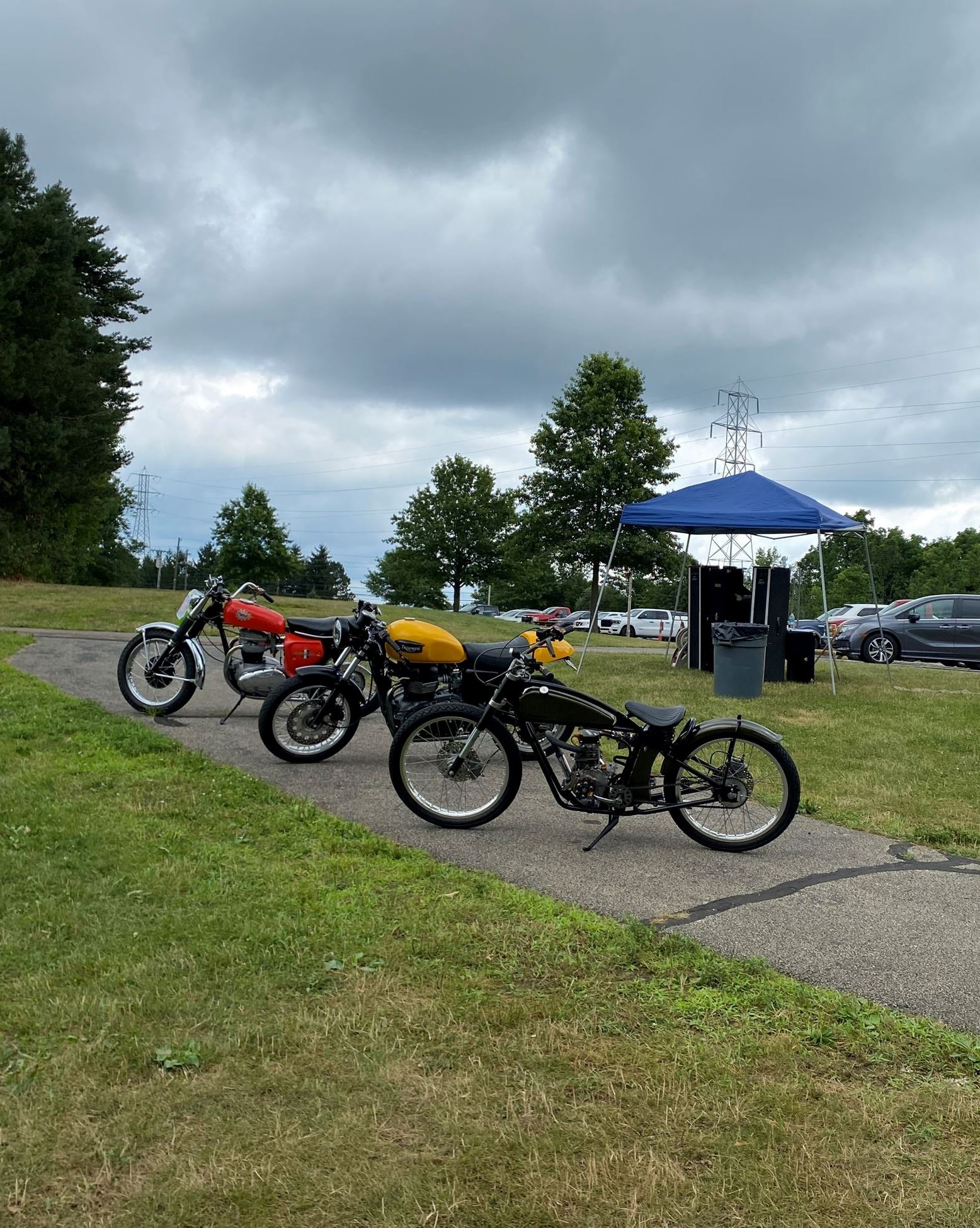 3 Motorcycles on Display Leaning on their Kickstands at Copley Car Show 2025