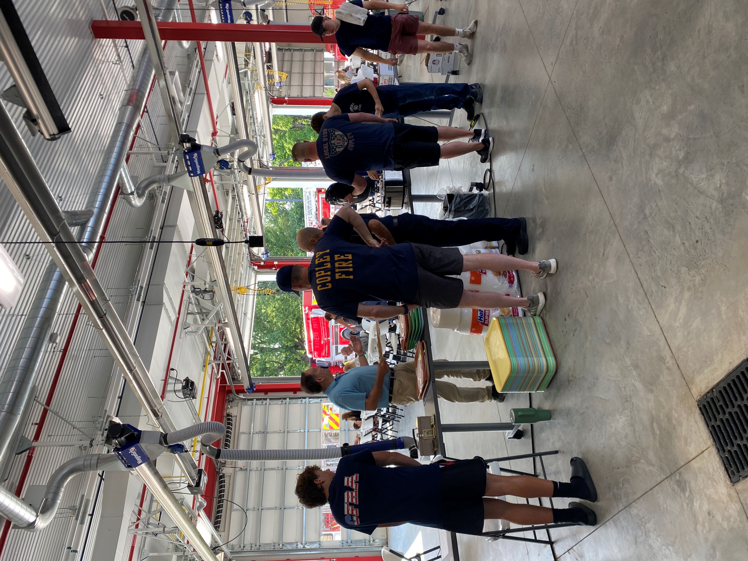 Firemen Serving Breakfast at Copley Fire & Rescue Pancake Breakfast to Trustee Scott Dressler