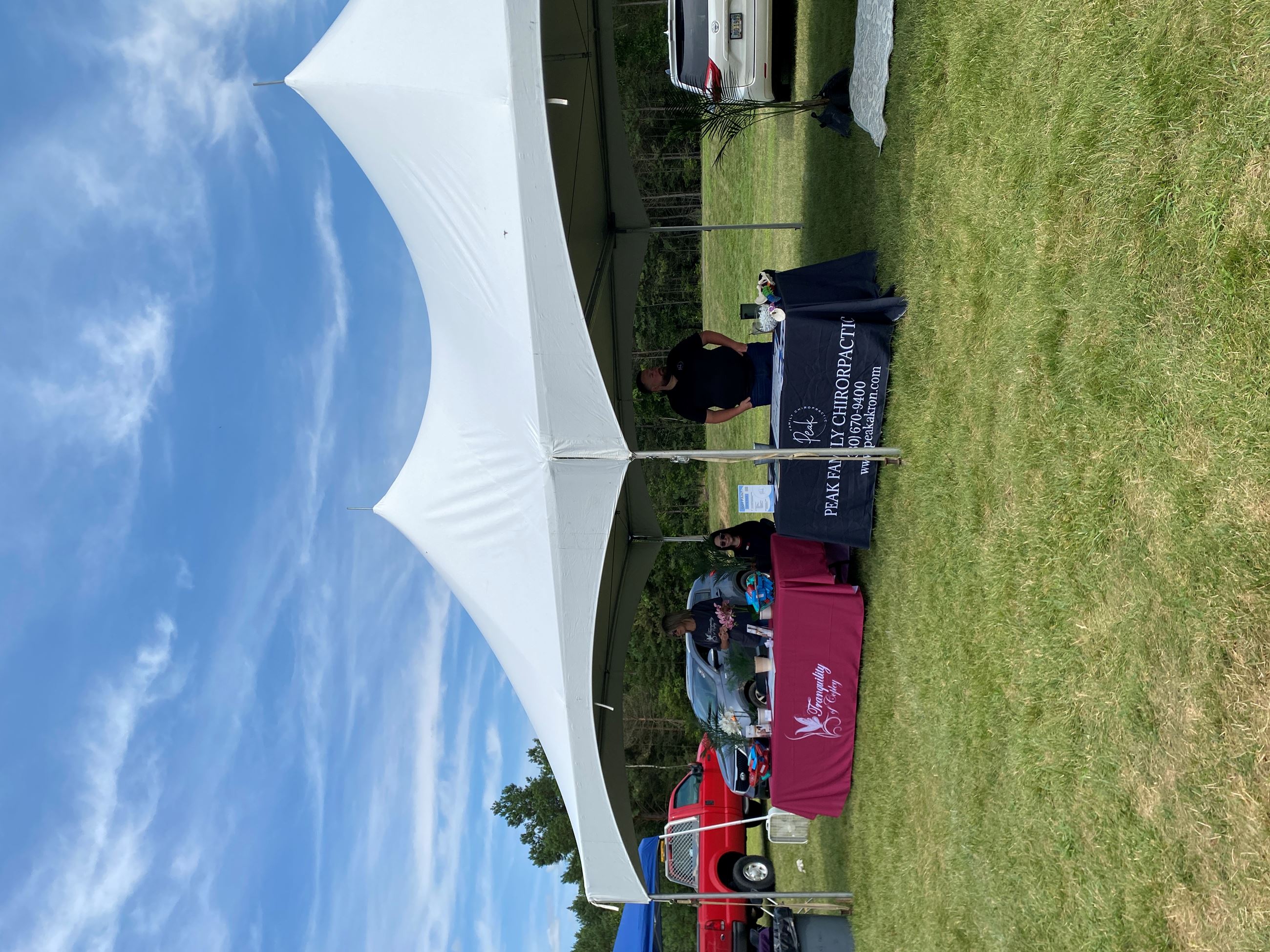 Vendors Set Up Under a White Tent At Copley Community Park on Saturday For Heritage Days 2025