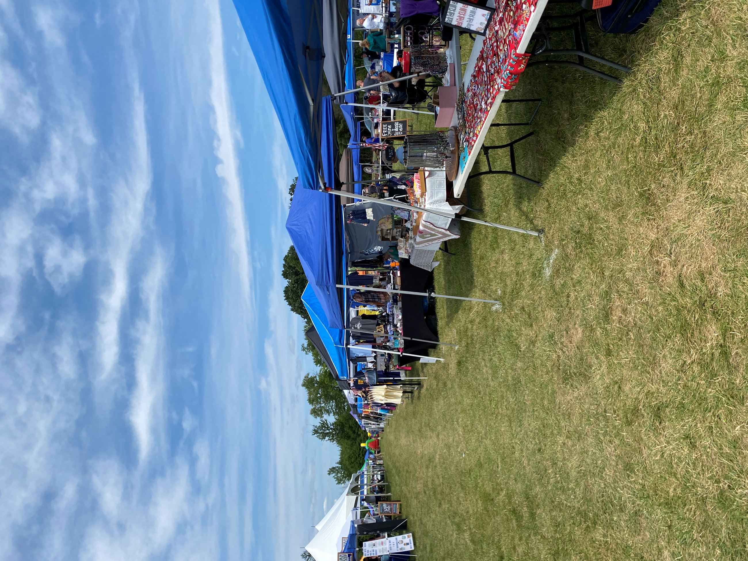 Rows of Vendors Set up With Their Tents at Copley Community Park